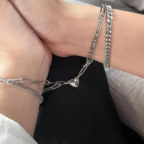 couple bracelets silver featuring matching chain link design and detachable magnetic heart pendants, symbolizing love and connection.