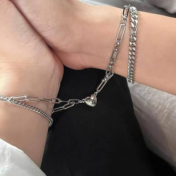 couple bracelets silver featuring matching chain link design and detachable magnetic heart pendants, symbolizing love and connection.