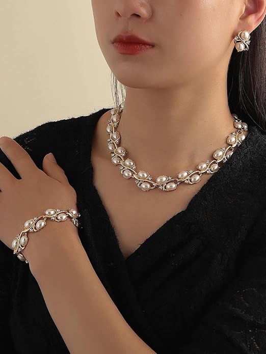 Elegant choker pearl necklace set with matching earrings and bracelet for festive wear