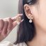 Elegant bow stud earrings for women with rhinestones and pearl center – perfect for casual and formal wear