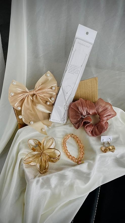 “Colorful and elegant hair accessory gift hampers for women with flower claw clips, butterfly stud earrings, Korean hair clips, and pastel scrunchies in a premium box”